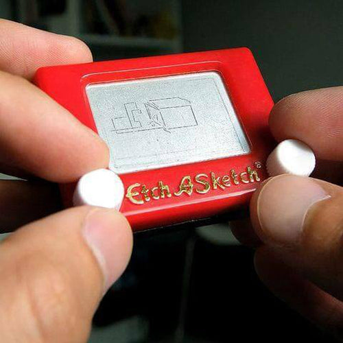 World's Smallest Etch A Sketch: A working mini model of the classic drawing  toy.